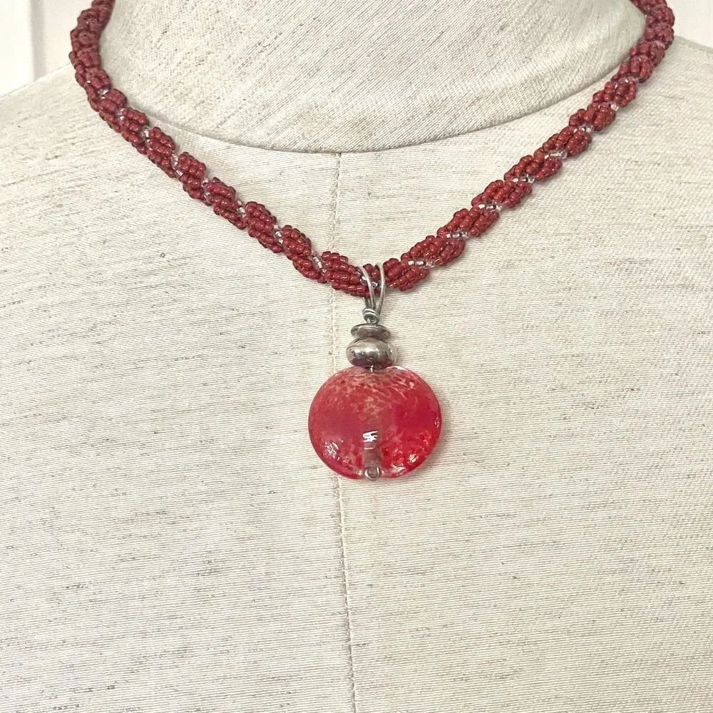 Red/orange beaded pendant necklace